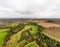 Aerial view, forest trees, woodland, deciduous temperate fog, lowland, Britain, UK, England, sunset Sunrise.