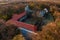 Aerial view about former benedictine monastery and church ruins.