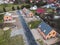 Aerial view of four new houses under construction in the country side of Slovenia