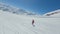 Aerial view fpv drone follow man enjoy freeride on snowboard extreme sport