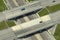 Aerial view of freeway overpass junction with fast moving traffic cars and trucks. Interstate transportation