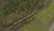 Aerial view of a freight train carrying lumber