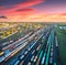 Aerial view of freight trains on railway station at sunset