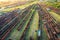 Aerial view of freight trains. Top view of old rusty wagons