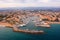 Aerial view of Frejus cityscape on Mediterranean coast with marina