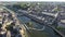 Aerial view of French town of Laval on banks of Mayenne river overlooking medieval Chateau in summer