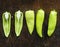 Aerial view of fresh jalapeno pepper on wooden background