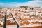 Aerial view of the Funchal old town - the capital of Madeira island during cloudy weather.