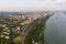 Aerial view of Galati City, Romania. Danube River near city with sunset warm light