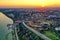 Aerial view of Galati City, Romania. Danube River near city with sunset warm light