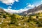 Aerial view of Gardena Pass, Sass da Ciampac, Tor Bornech and Sass dla Luesa, Trentino Alto Adige, Italy. Alpine meadows and Passo