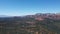 Aerial view of geological formations in Sedona desert town, Arizona, in daylight