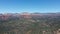 Aerial view of geological formations in Sedona desert town, Arizona, in daylight