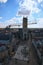 Aerial view of Ghent from Belfry. Repairing work with using yellow crane for lifting loads.