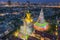 Aerial view of the Giant Golden Buddha in Wat Paknam Phasi Charoen Temple in Phasi Charoen district on Chao Phraya River at night