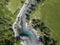 Aerial view of the giant rock called the Bidet della Contessa in the Val di Mello, a green valley. Sondrio. Italy