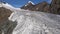 Aerial view of the glacial landscape on a sunny day. Large mountains