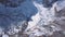 Aerial view of a glacier huge pieces of frozen ice and rock, top view