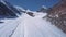 Aerial view of a glacier huge pieces of frozen ice and rock, top view. The glacier melts, the problems of ecology and