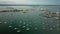 Aerial view of Goat Island Marina, yachts and Claiborne Pell Suspension Bridge in Newport, Rhode Island.