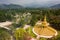 Aerial view of gold buddist pagoda in saraburi central of thailand