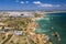 Aerial view of golden coast cliffs of portuguese southern beaches in Lagos City, Algarve