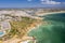 Aerial view of golden coast cliffs of portuguese southern beaches in Lagos City, Algarve, Portugal