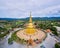 Aerial view Golden Pagoda Sri Vieng Chai Of Phra Phutthabat Huai Tom Temple Lamphun, Thailand