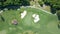 Aerial view of golf fields in tropical country