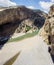 Aerial view of the gorge with prehistoric caves over the the wide and almost dry river bed of Cendere. Nemtur Dagi road. Turkey