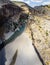 Aerial view of the gorge with prehistoric caves over the the wide and almost dry river bed of Cendere. Nemtur Dagi road. Turkey