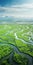 Aerial View Of Grassy Marsh: Captivating Lagoon Field Photography