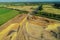 Aerial view Gravel quarrying from the air in a gravel pit