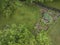 aerial view of a green backyard and garden in spring scenery