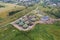 Aerial view of green biogas plant storage tanks