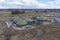 Aerial view of green biogas plant storage tanks