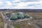 Aerial view of green biogas plant storage tanks