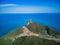 Aerial view of green Cape of Rodon on a sunny day