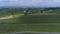 Aerial View of Green Farmlands With Different Crops Growing in the Fields