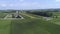 Aerial View of Green Farmlands With Different Crops Growing in the Fields