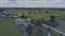 Aerial View of Green Farmlands With Different Crops Growing in the Fields