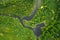 Aerial View. Green Forest, Meadow And River Marsh Landscape In Summer. Top View Of European Nature From High Attitude In