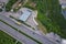 Aerial view of a green gas station in the city near the road for cars. The concept of increasing the cost of gasoline and diesel