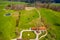 Aerial view of the green golf course. Target at driving Range