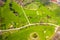 Aerial view of the green golf course. Target at driving Range