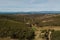 Aerial view of green meadows on a sunny day in Braganca, Portugal