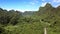 Aerial View Green Rural Valley with Road near Hills in Highland