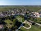 Aerial view on green vineyards, wine domain or chateau in Haut-Medoc red wine making region, Bordeaux, left bank of Gironde