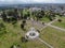 Aerial view of Greenwood Memorial Park with Memorial Statue and American flag