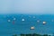 Aerial view of group of boats in sea near Singapore beach with blue sky for travel and transportation background